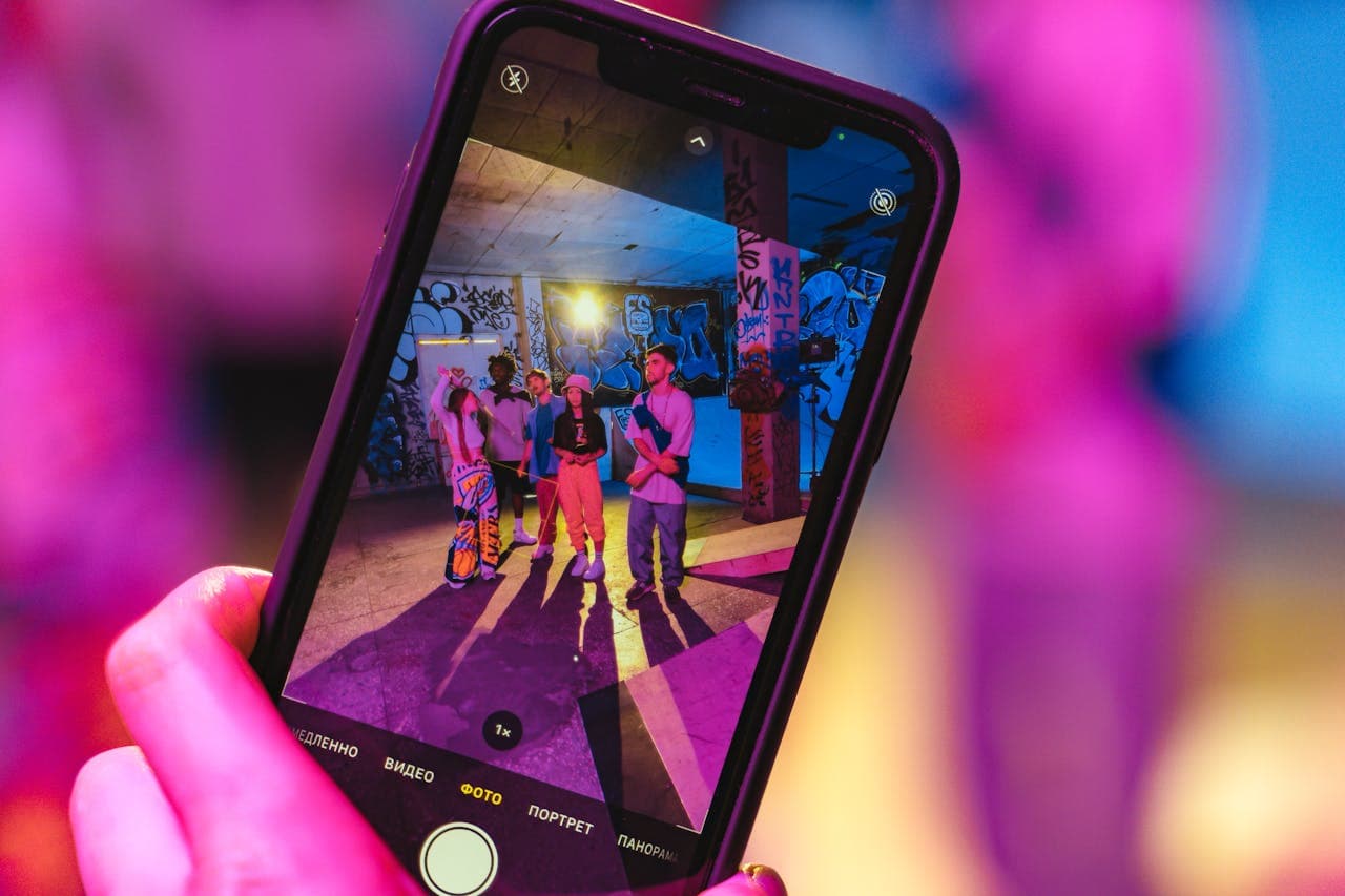 Close-Up Shot of a Person Taking Photo Using a Smartphone